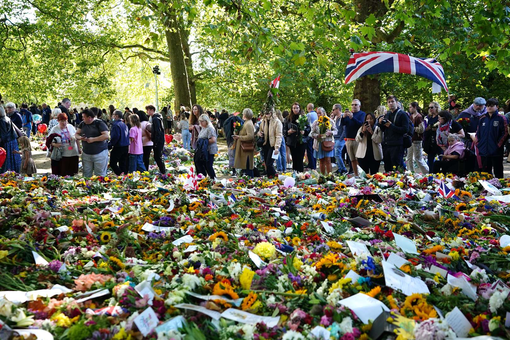 Flowers in Green Park following the death of Queen Elizabeth II (Zac Goodwin/PA)