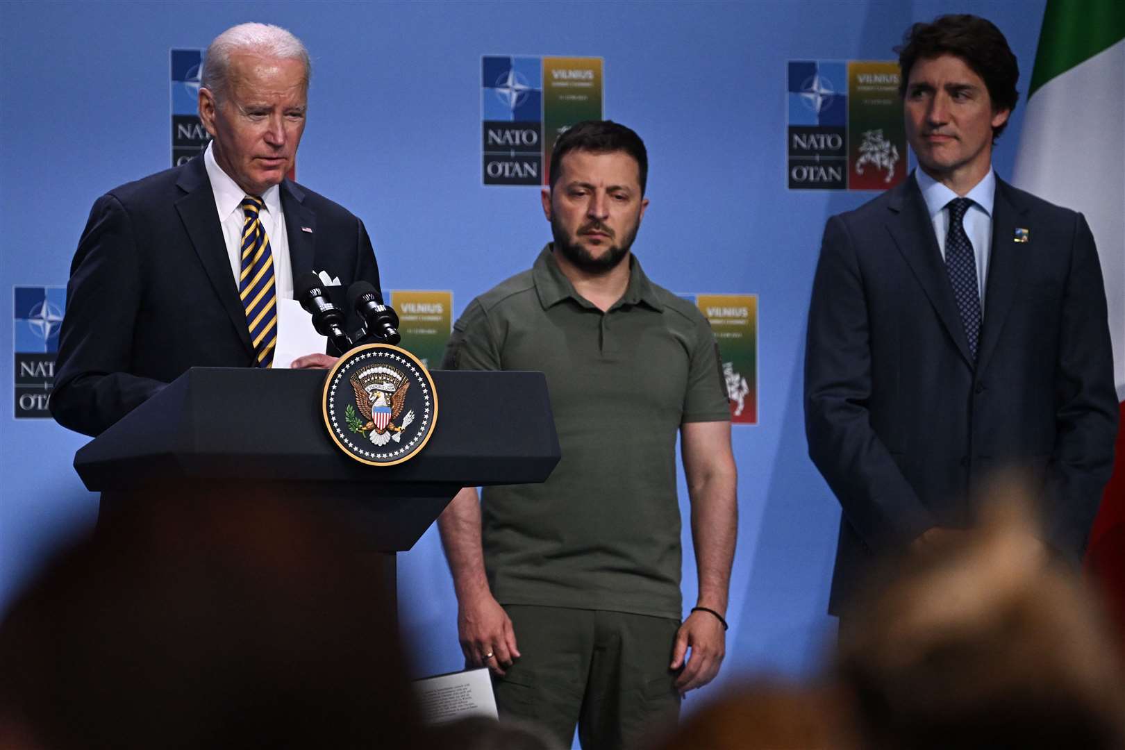 US President Joe Biden speaks at an event with G7 leaders next to Ukrainian President Volodymyr Zelensky and Canada’s prime minister Justin Trudeau (Paul Ellis/PA)
