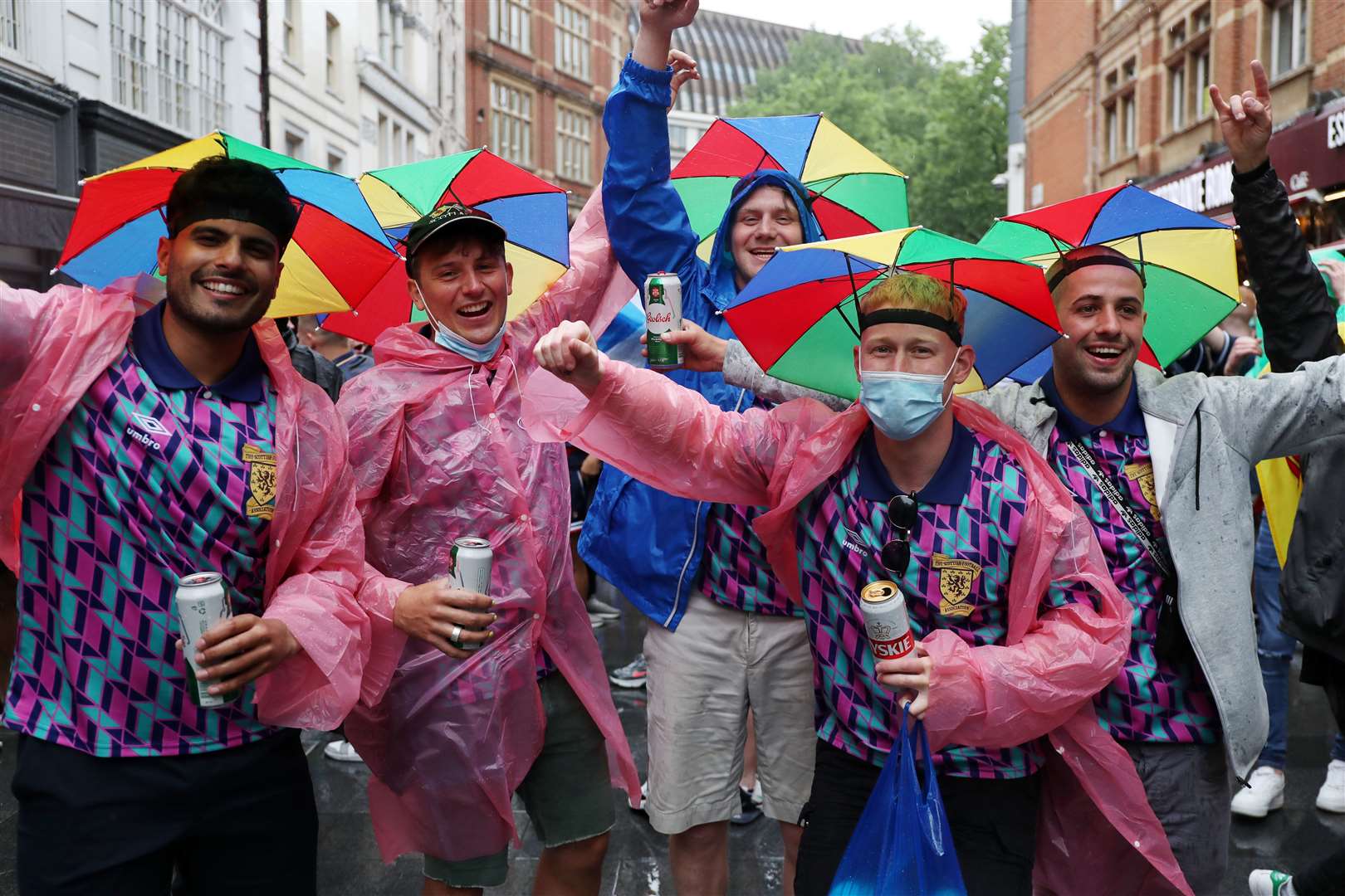 Scotland fans bring some colour to a rain-soaked Leicester Square (Kieran Cleeves/PA)