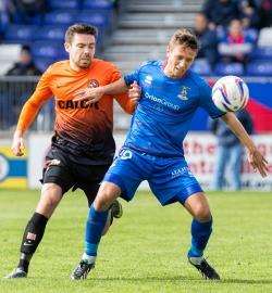 Danny Williams, in action for Caley Thistle against Dundee United's Ryan Gow last season, is confident the Inverness side can again be challenging for European competition.