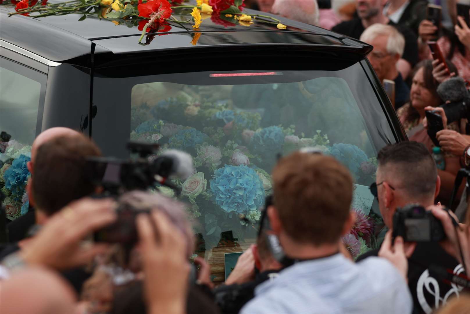The singer’s funeral cortege passed through her former home town of Bray ahead of a private burial service (Liam McBurney/PA)