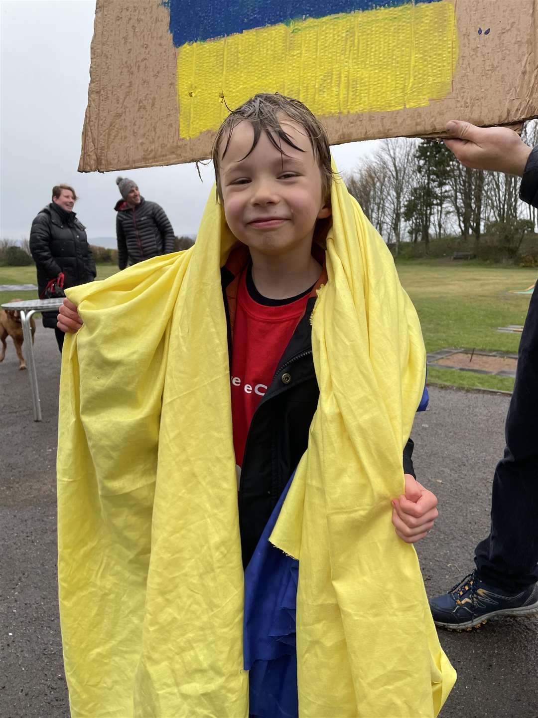 Magnus henderson with a Ukrainian flag during his walk.