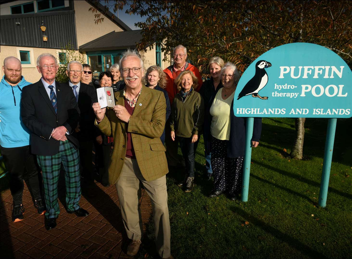 MBE recipient Dr Malcolm Monteith with others who support the Puffin Pool hydrotherapy facility in Dingwall. Picture: James Mackenzie