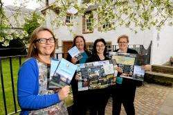 Inverness Outlanders group, from left Sinead Robertson, Julie Mutch, Lisa Davies and Carol Ann McRitchie, display the map outside Abertarff House, Church Street, which is featured in one of the books. Picture: Gary Anthony. Image No: 041052