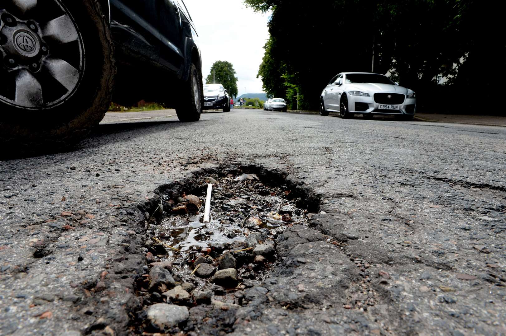 Charles Bannerman potholes from roads and pavements being dug up: A pothole in Bruce Gardens..Picture: James Mackenzie..