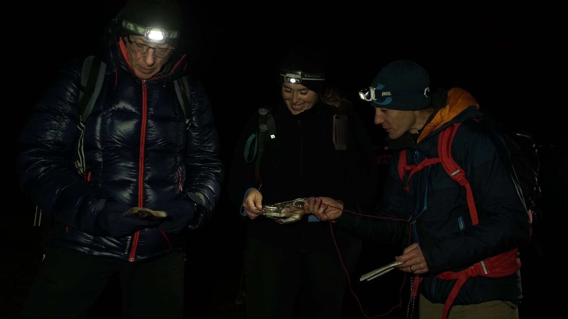 Navigating off the hill in darkness. Head torches are an essential piece of kit. Picture: Paul Diffley