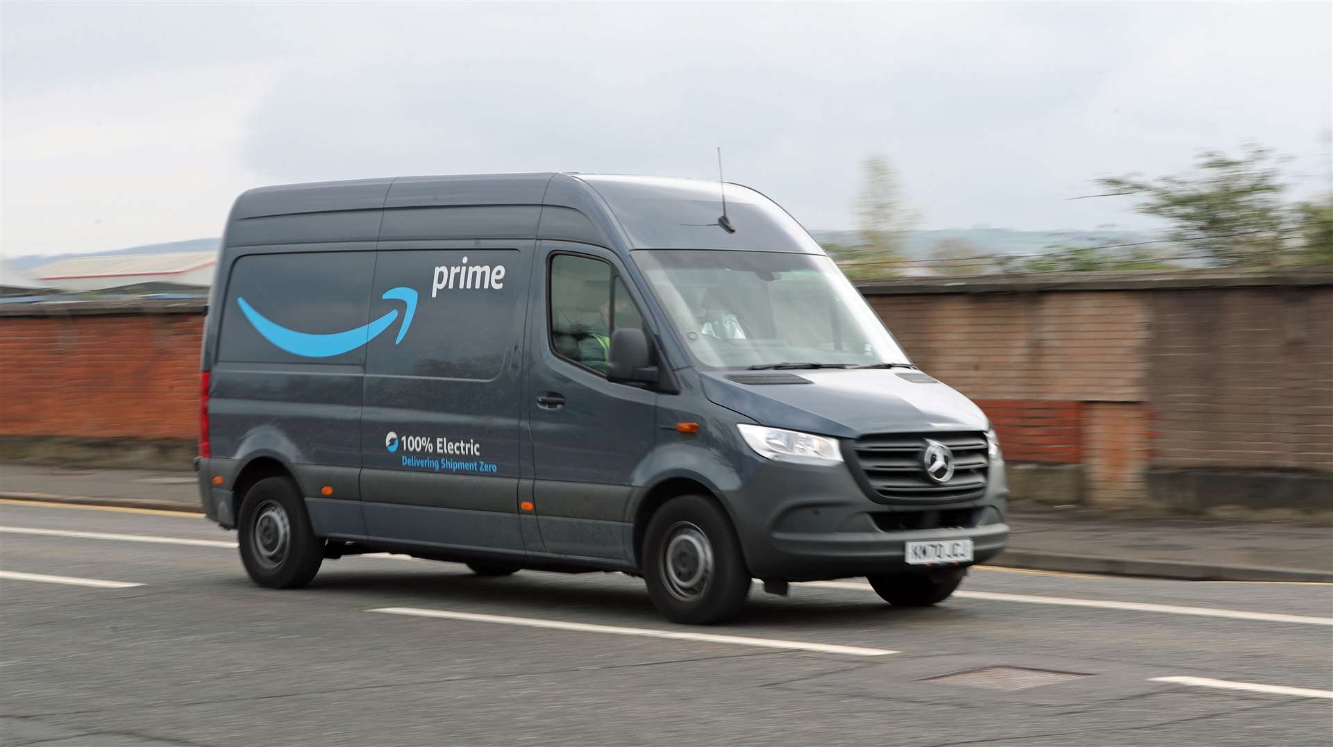 Amazon had more than 9,000 electric vehicles in its global delivery fleet in 2022 (PA)