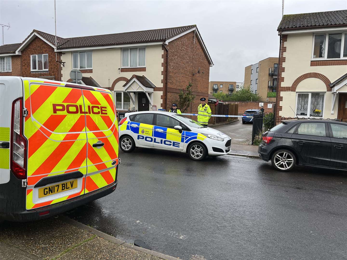 Police officers at the scene in Priory Road, Dartford, Kent (Joseph Draper/PA Media)