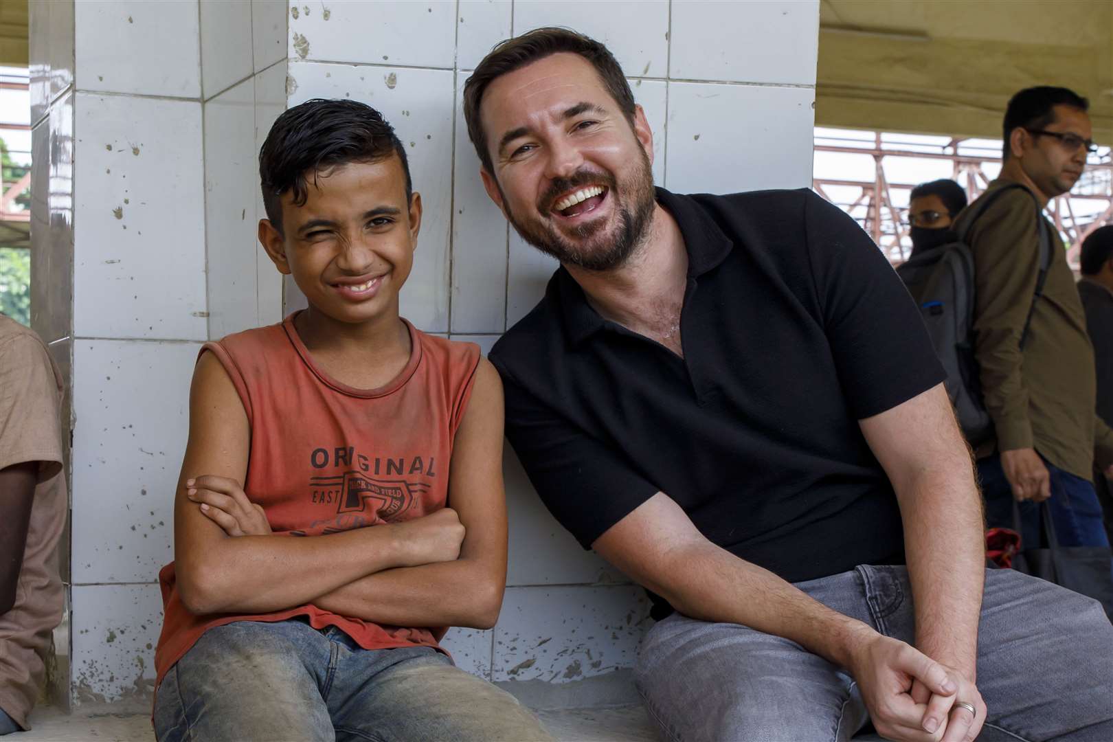 Martin Compston with Hridoy, a boy he met during his visit (Unicef/KM Asad/PA)