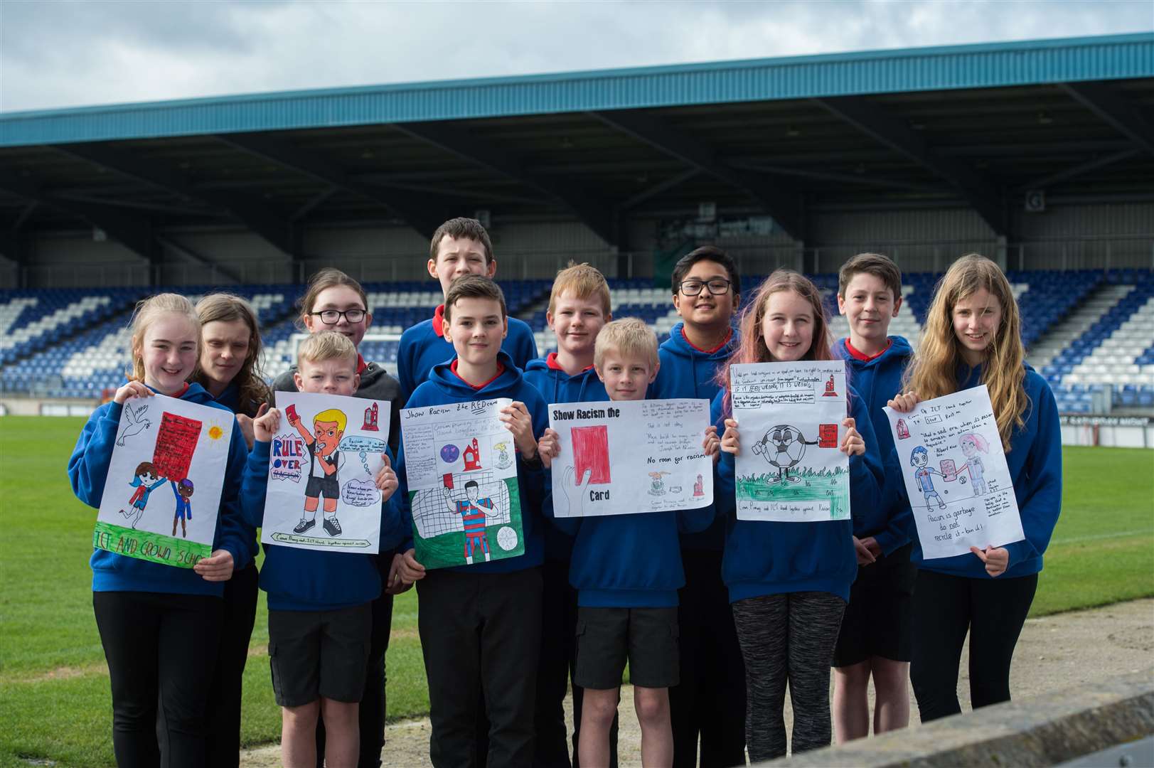 Some of the children with the six winning posters. Picture: Callum Mackay. Image No. 043448.