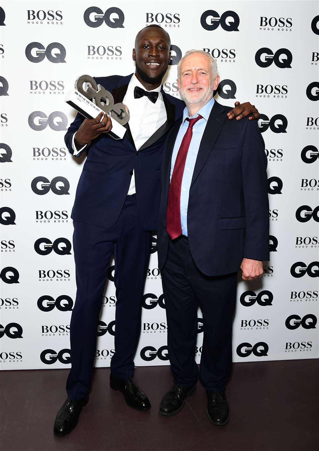 Stormzy with Jeremy Corbyn during the GQ Men Of The Year Awards in 2017 (Ian West/PA)