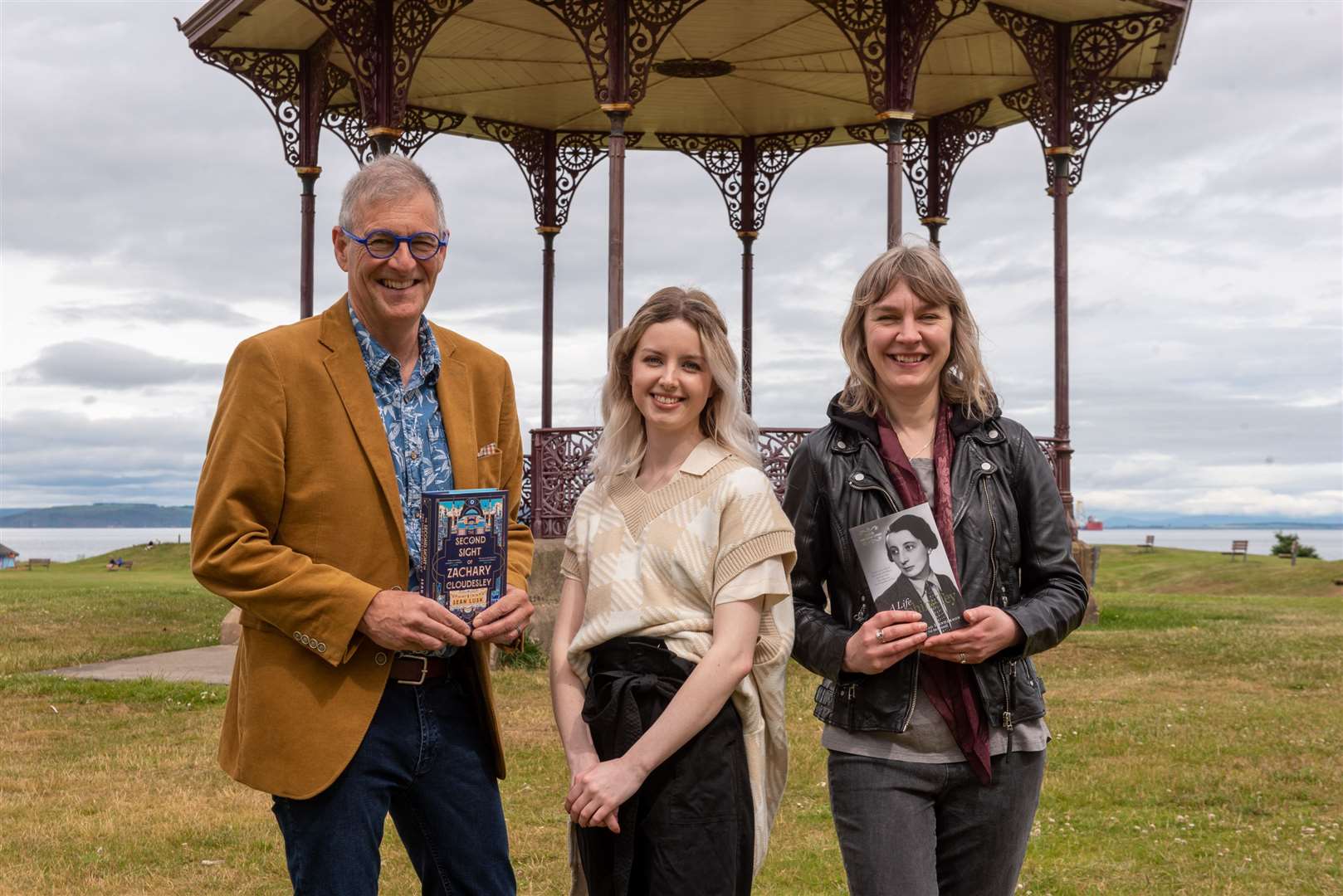 Musician Sean Lusk with authors Kenna Ross and Jennifer Morag Henderson. Picture: Marc Marnie.