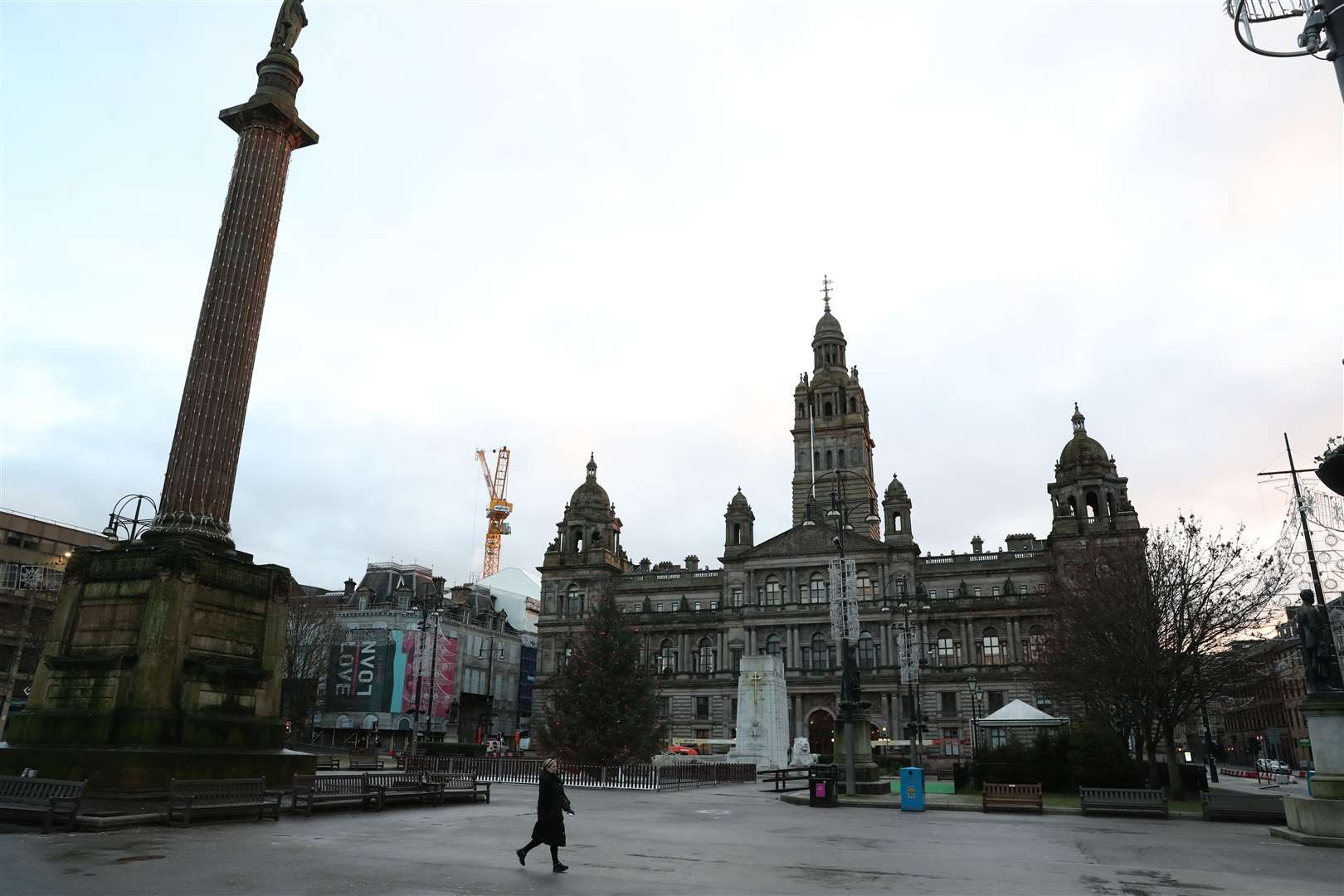 There were few people in the city’s famous George Square as the measures kicked in (Andrew Milligan/PA)