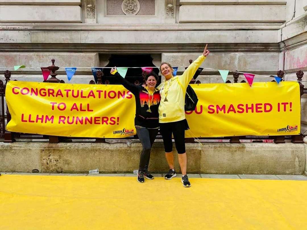 A pair of runners elated after completing London's half marathon. Picture: Highland Hospice.