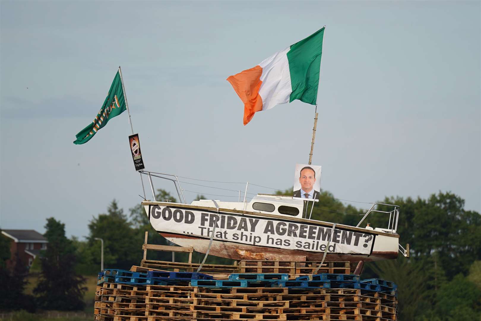 A pyre with a boat on top, with a picture of Taoiseach Leo Varadkar (PA)