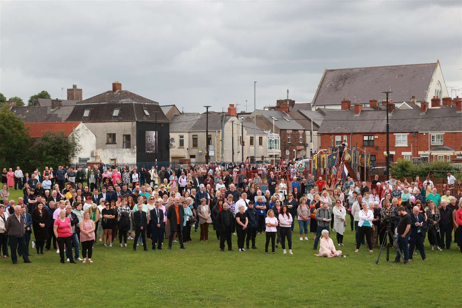 Crowds of people watched the service from King George Harryville Park, Ballymena (Liam McBurney/PA)