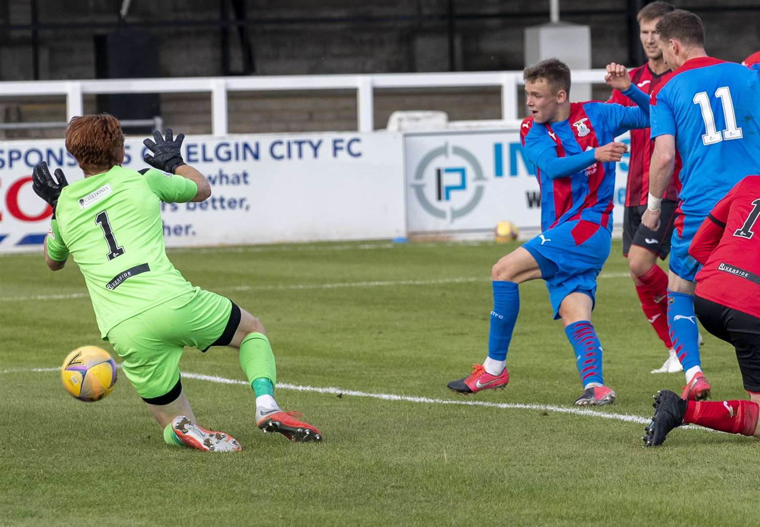 Picture - Ken Macpherson, Inverness. Pre-Season Friendly. Elgin City(3) v Inverness CT(7). 26.09.20. ICT's Roddy MacGregor scores his side's 5th goal past Elgin City 'keeper Tom McHale.