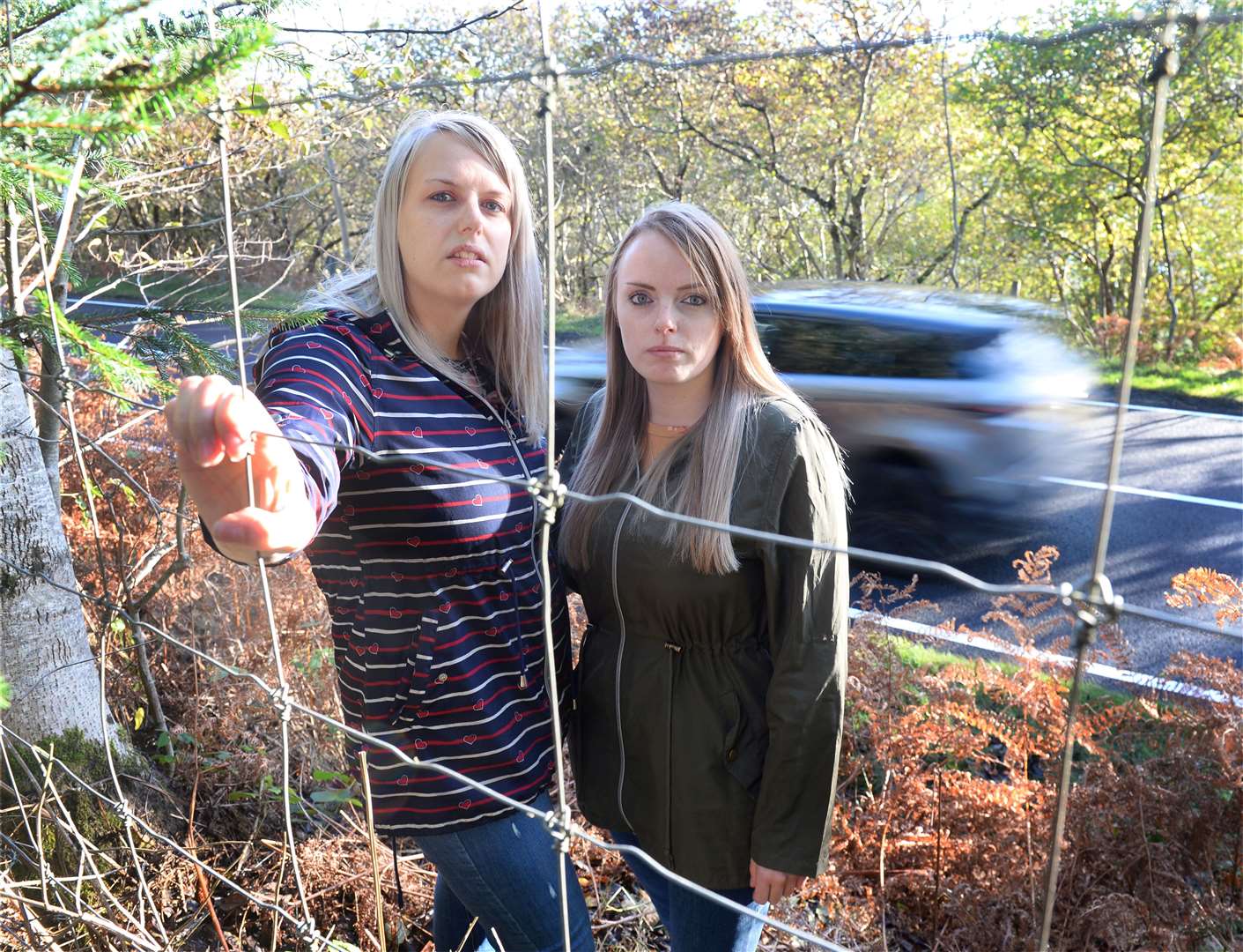 Samantha (left) and Kirsti Foster have a deer fence around their property at Lochend. Picture: Gary Anthony