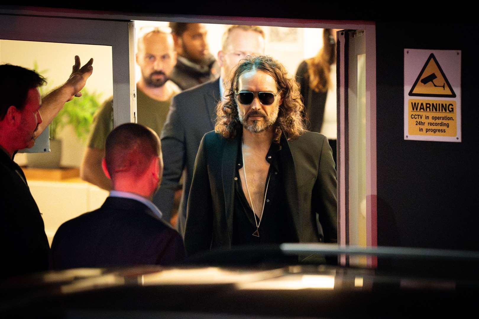 Russell Brand leaving the Troubabour Wembley Park theatre in London after performing a comedy set on September 16, before the remaining tour dates were postponed (James Manning/PA)