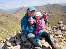 Peter at the top of Sgurr na Sgine, his last Munro, with Clara Davidson (14 months) on her first.