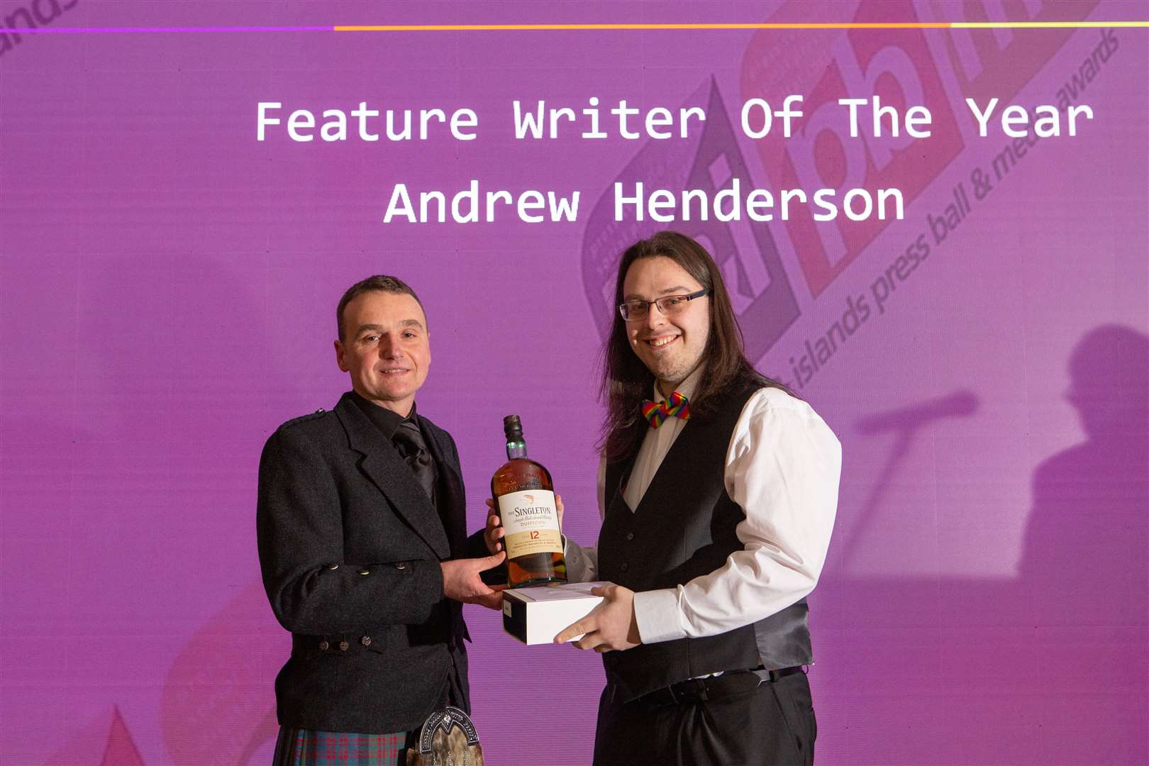 Andrew Henderson, of Highland News and Media, receives his award as Feature Writer of the Year. Picture: Alison White.