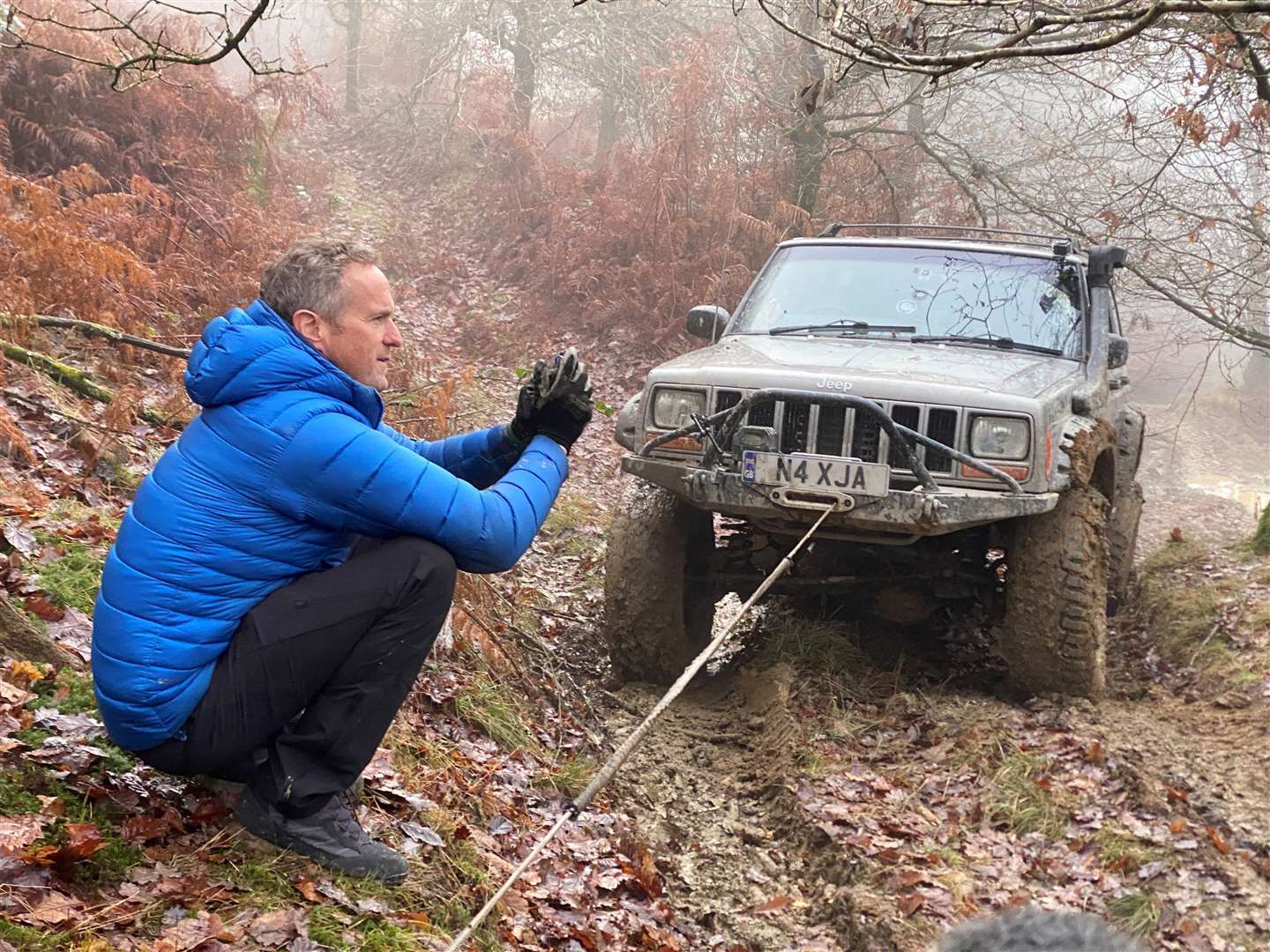 Presenter Tim Shaw with the Jeep Grand Cherokee (National Geographic/PA)