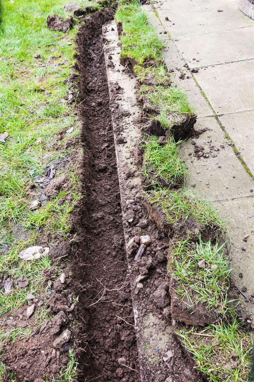 A trench at the bottom of a lawn for a drainage channel. Picture: iStock/PA