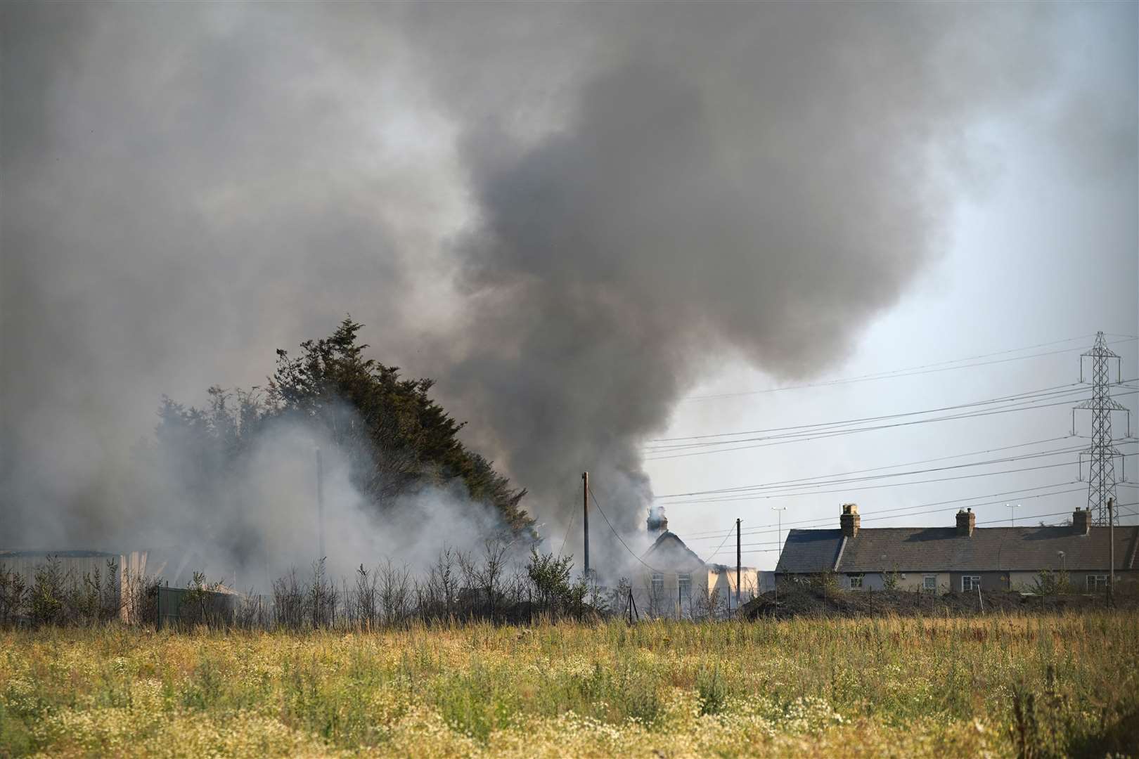 The scene of a blaze in the village of Wennington (Yui Mok/PA)