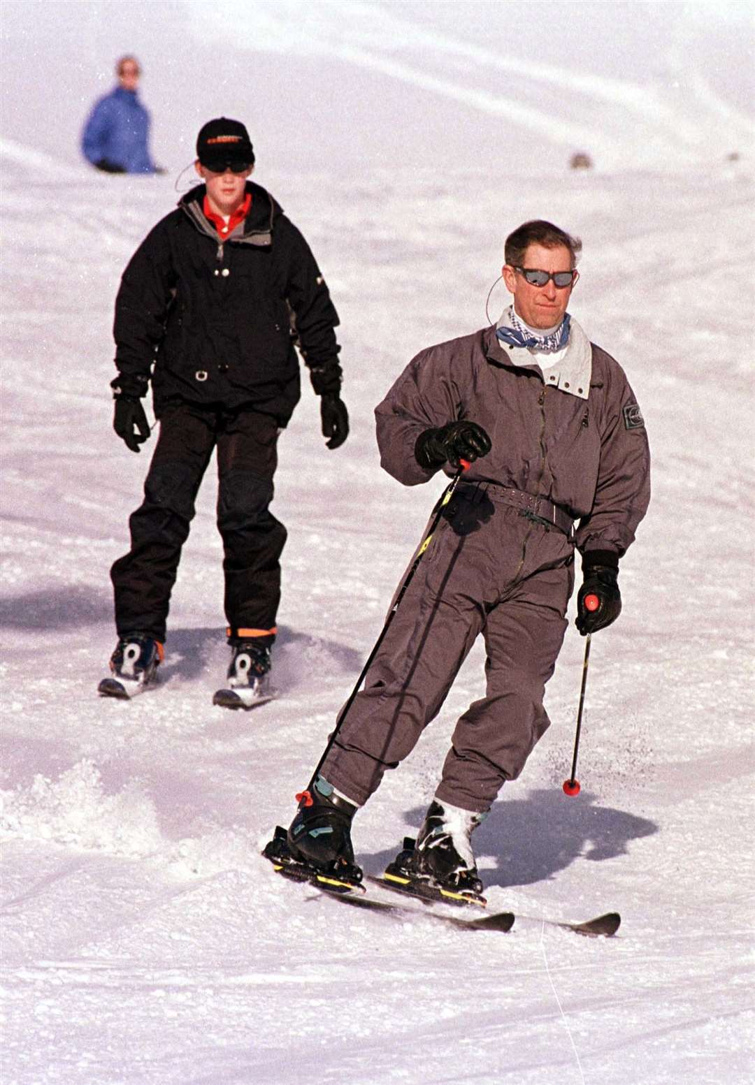 Charles, with Harry in 1999, is an accomplished skier (PA)