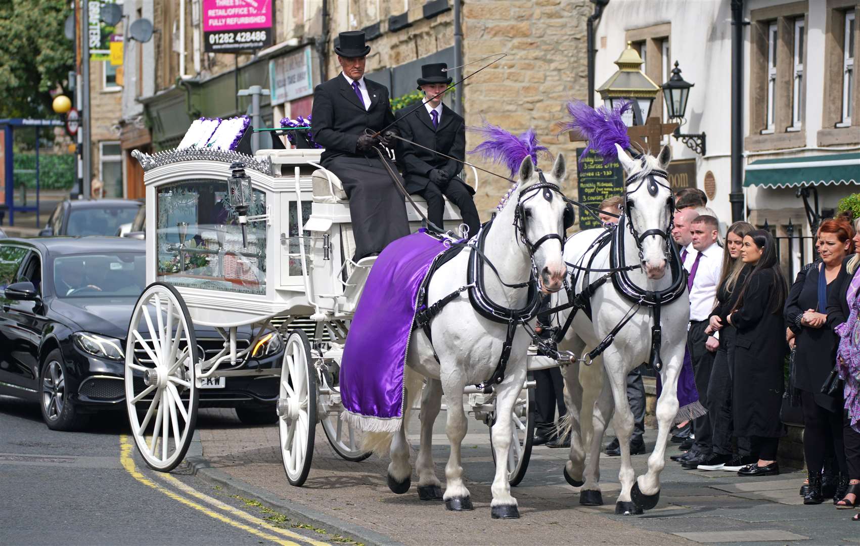 A horse drawn hearse arrives for the funeral of murdered mother of two Katie Kenyon (Peter Byrne/PA)