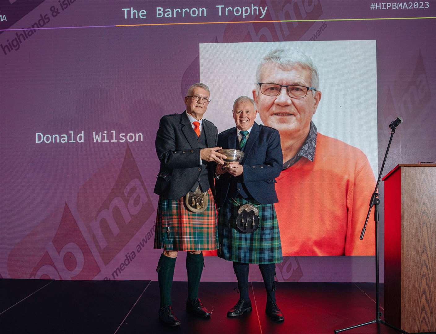 Donald Wilson (left) receives his award from Gordon Fyfe. Picture: Alison White.