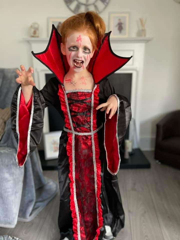 Grace Clark dressed as a witch