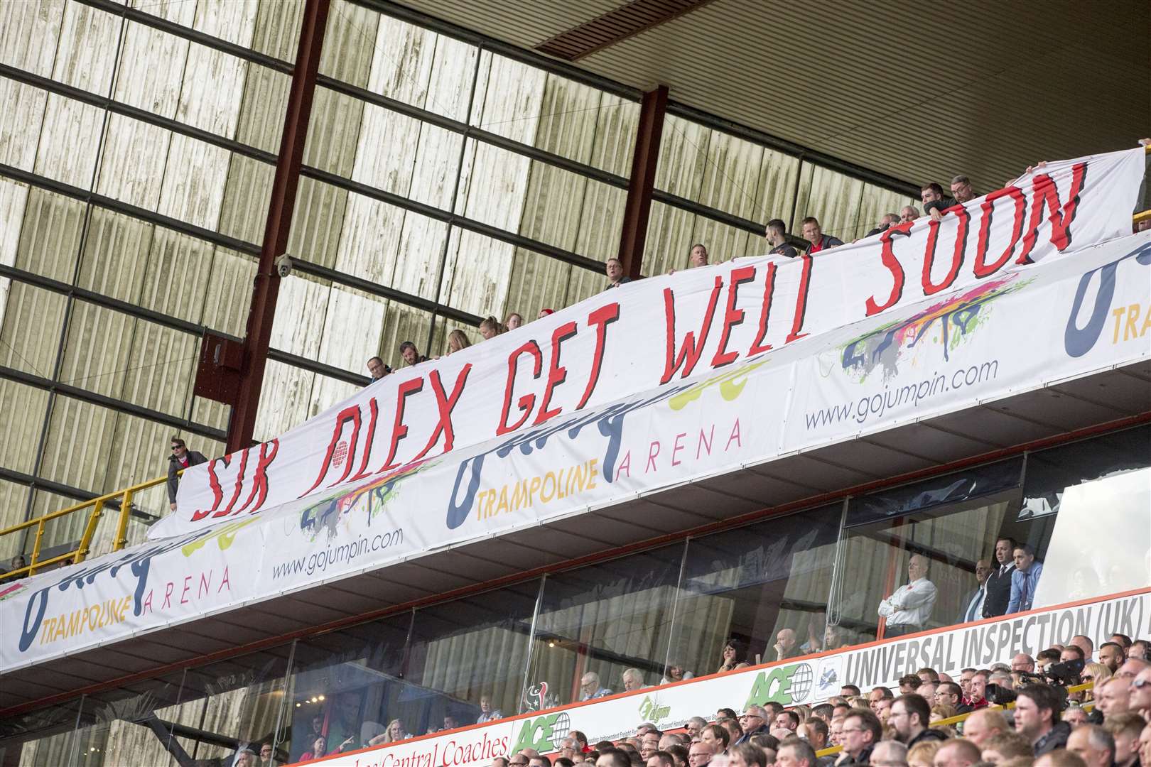Aberdeen fans unfurl a banner of support for Sir Alex Ferguson (Jeff Holmes/PA)