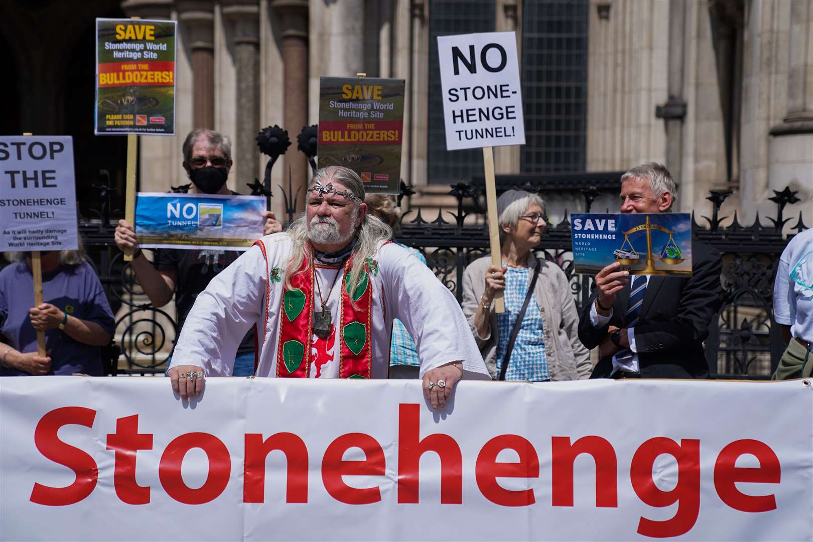 Campaigners outside the High Court in central London (Kirsty O’Connor/PA)