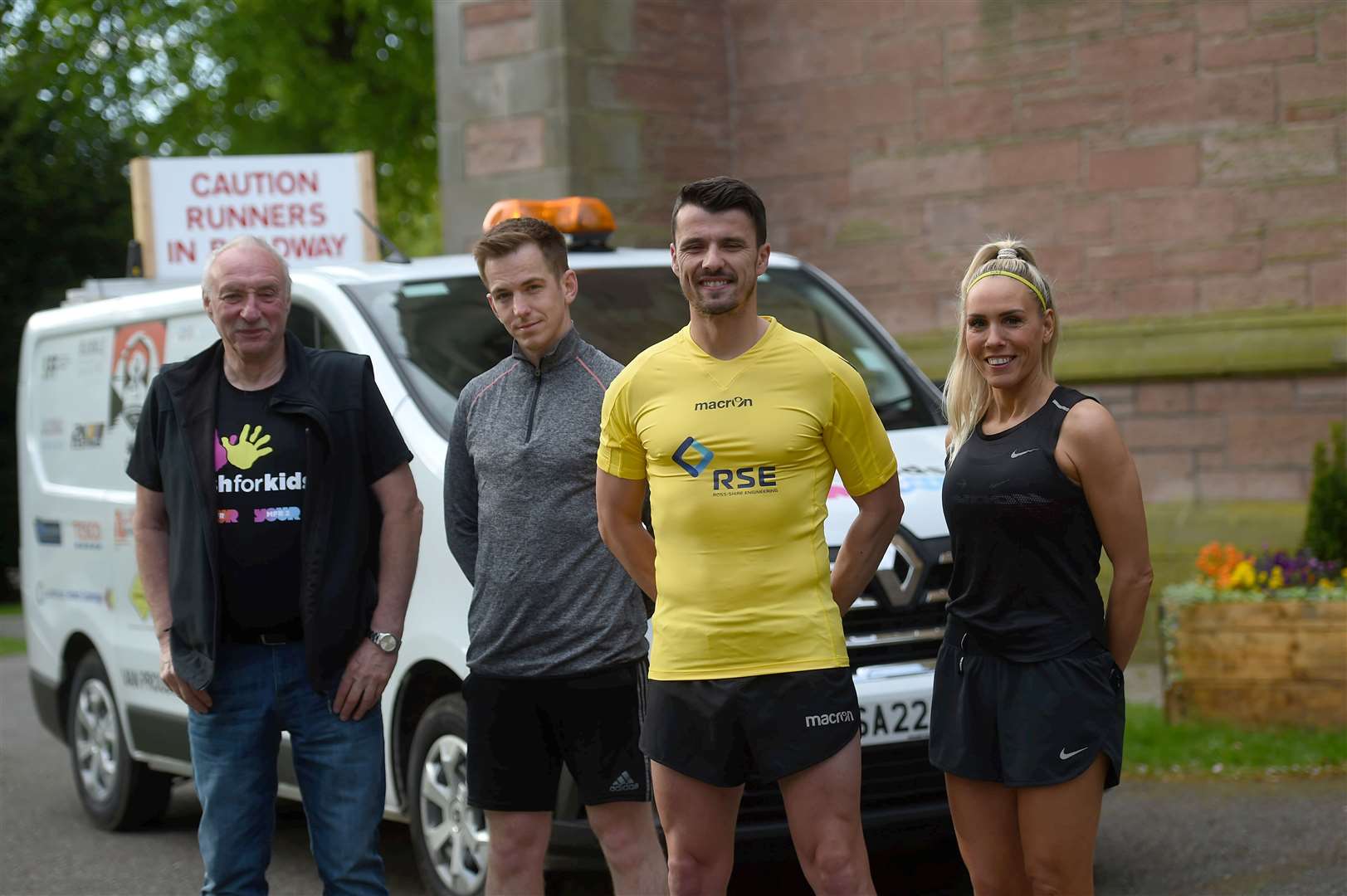 Steven Mackay is running all 516 miles of the NC500 in just 10 days. From left, Donald Grant (driver) Andrew Macleod, Steven Mackay and Kellie Calder. Picture: Callum Mackay