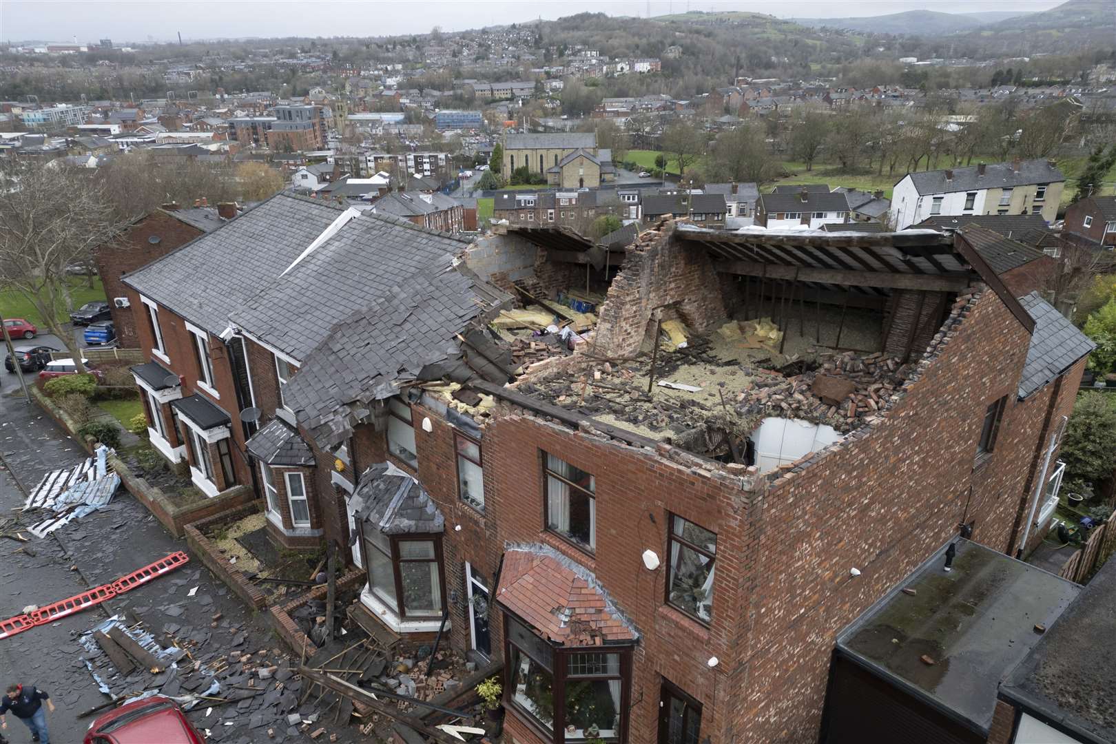 The ‘localised tornado’ ripped off roofs and brought down walls (AP Photo/Jon Super)
