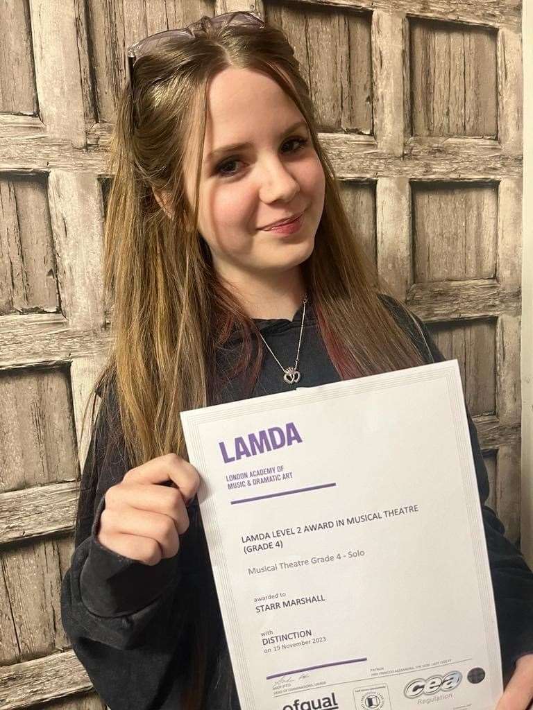 Starr Marshall passed her Level 2 LAMDA exam in musical theatre.