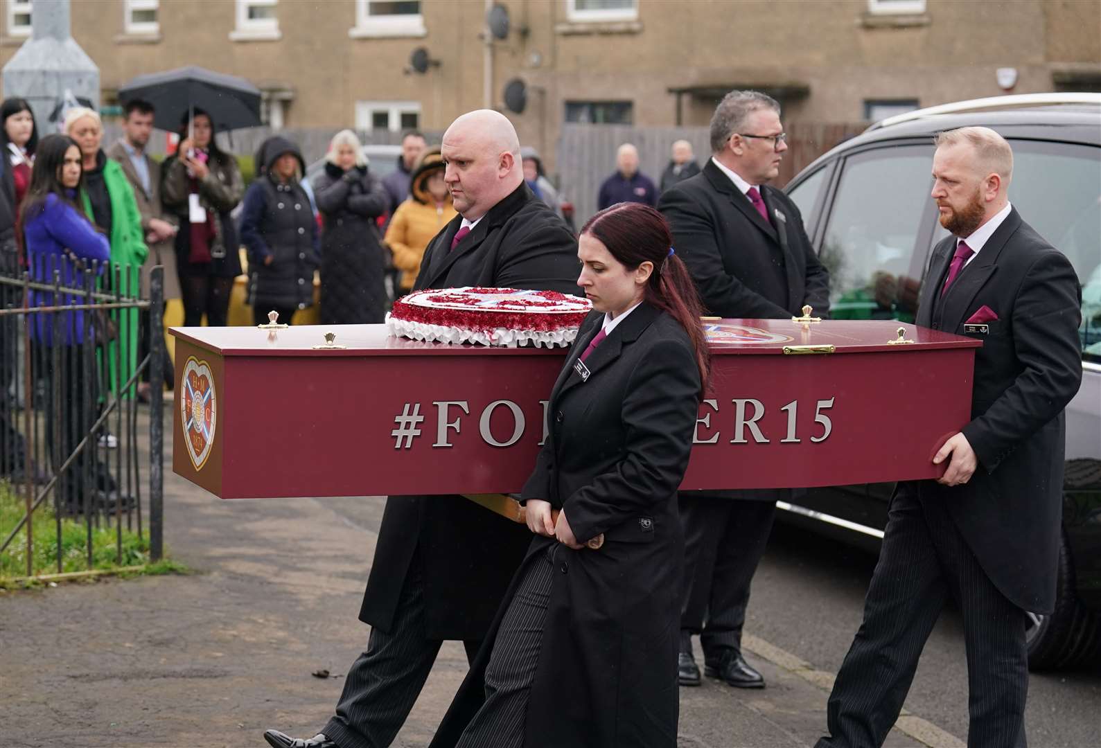 The coffin carried the hashtag #forever15, in reference to Andrew’s young age (Andrew Milligan/PA)