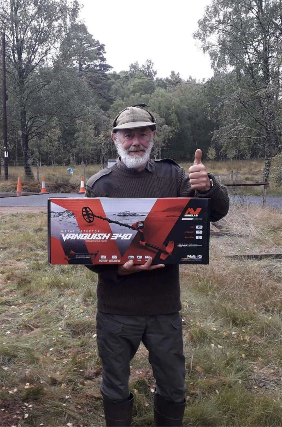 Lucky number's winner Dennis Ross with his prize, a Vanquish 340 metal detector.