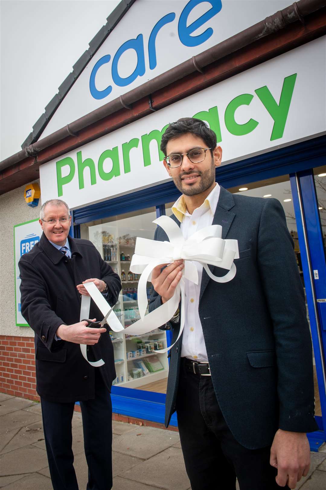 New Cradlehall Pharmacy ribbon cutting ceremony..Councillor Duncan Macpherson and Mo Ameen Pharmacist...Picture: Callum Mackay..