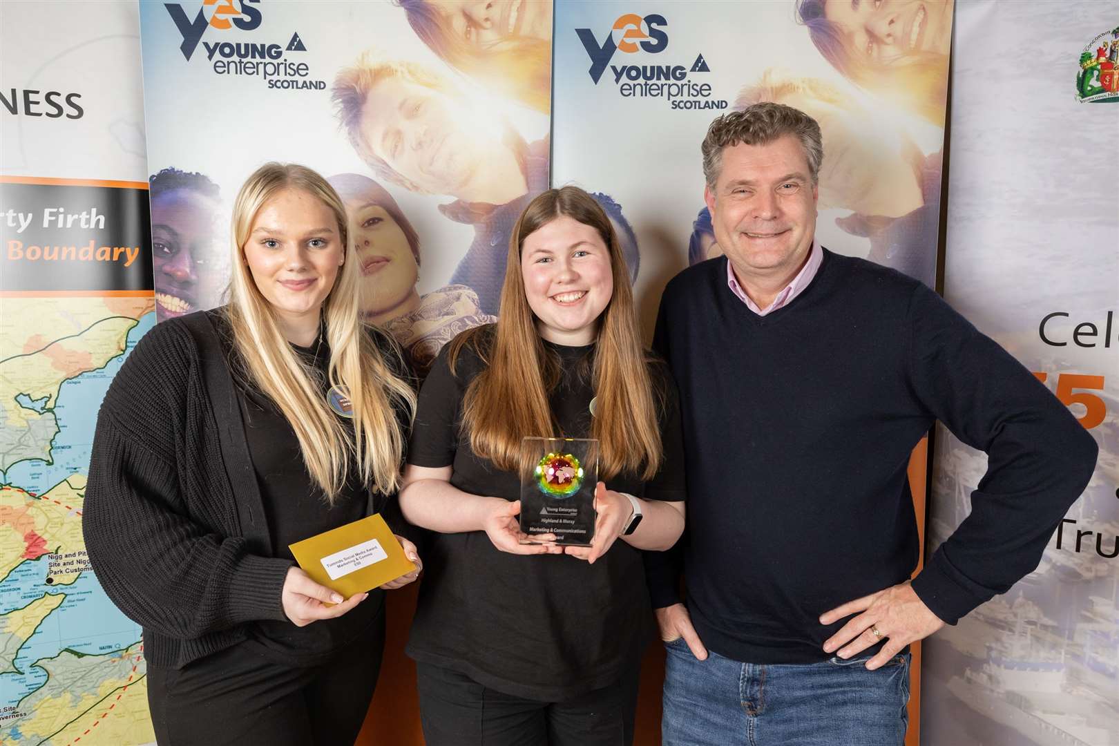 Inverness Royal Academy (l-r): Sadie Traill, Mollie MacBride, Rene Looper from category sponsors Tuminds.