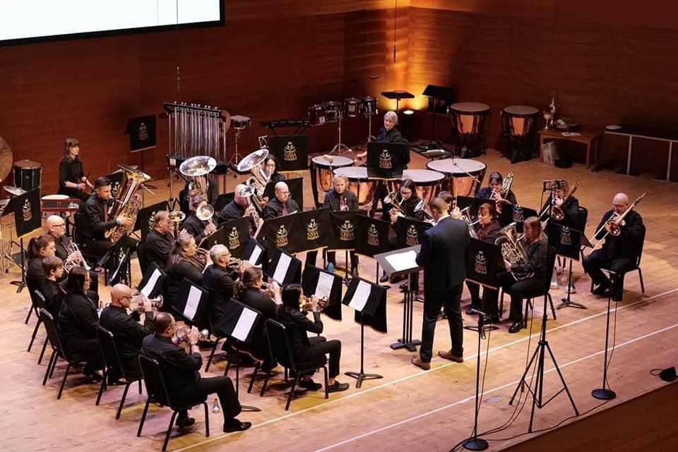 Highland Brass on stage at the 2023 Scottish Brass Band Association Championship.