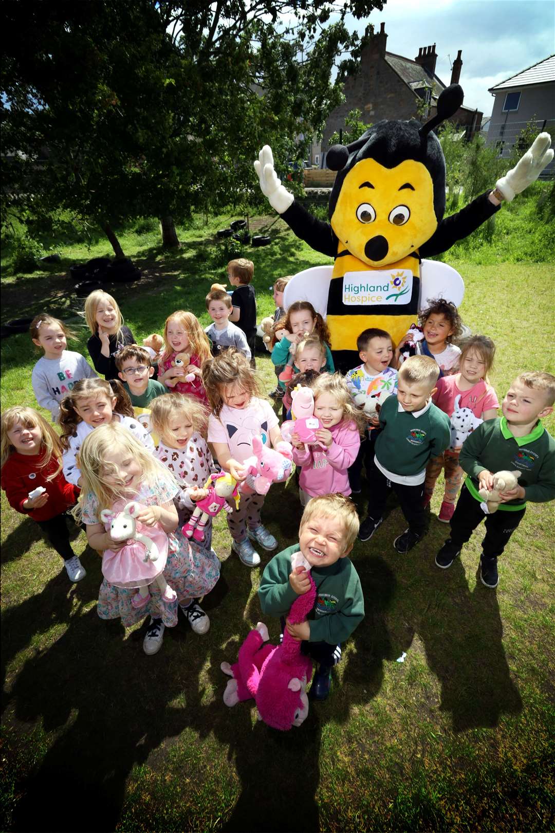 Bobby the bee getting a photo with the children. Picture: James Mackenzie.