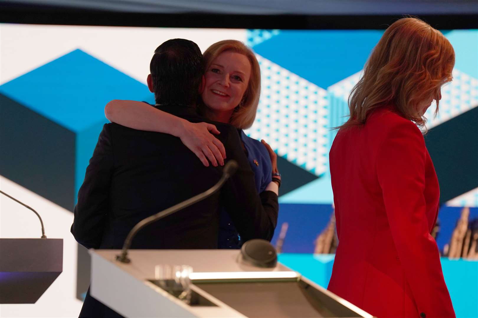 Rishi Sunak and Liz Truss gave each other a hug after taking part in the BBC Tory leadership debate (Jacob King/PA)