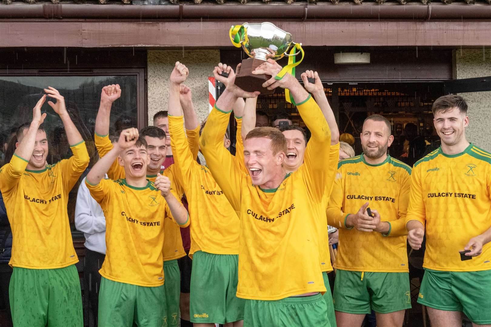 Glengarry team captain Nick Dalgety lifts the trophy. The Single Team Cup Final - Glengarry v Kilmory, played at An Aird, Fort William.