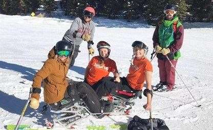 Melanie conquers sit-skiing in Colorado.