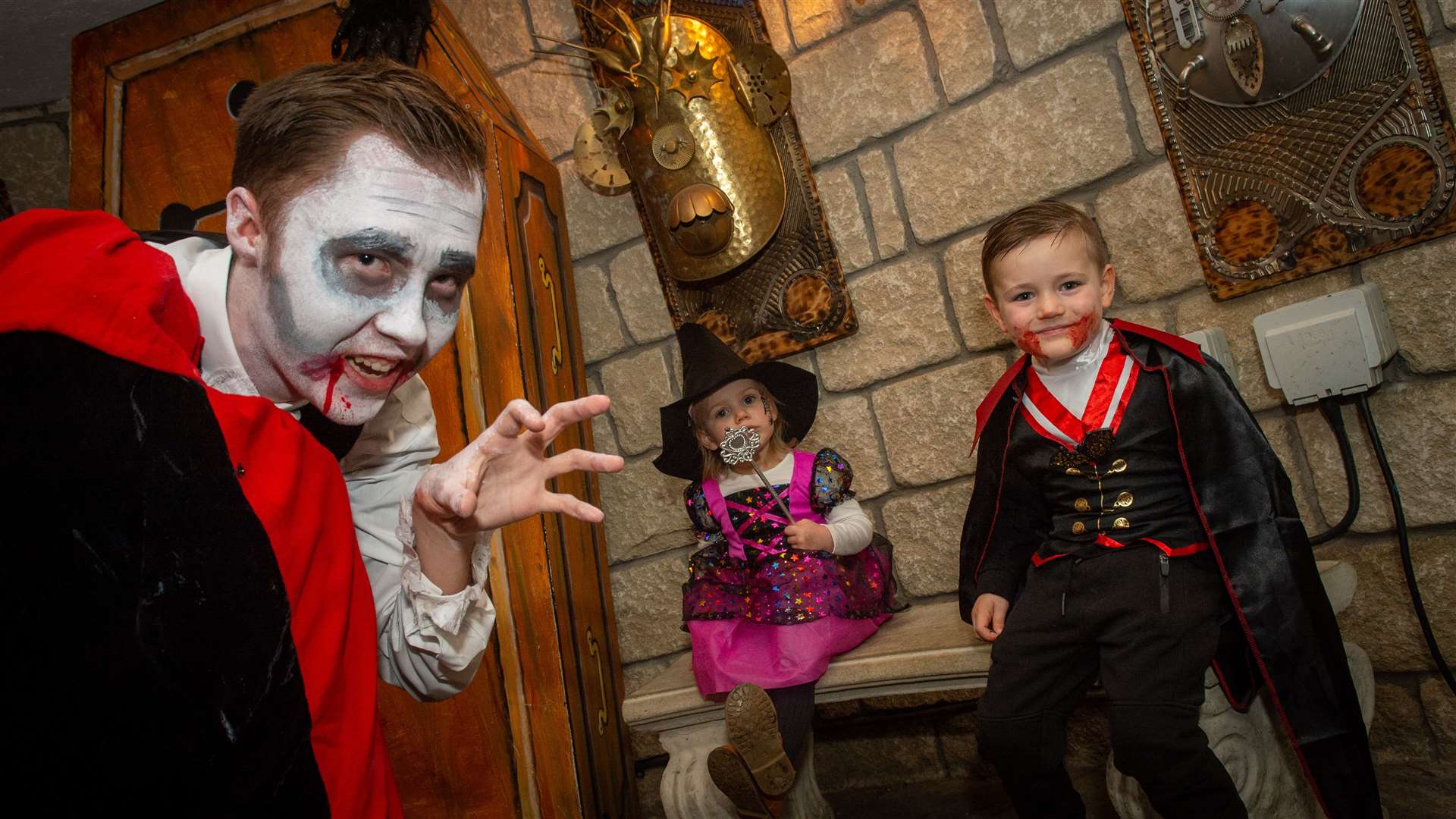 BOOtanics at the Botanic Gardens, Inverness. Light up trail event, where there are spooky decorations...Count Dracula with Luna and Riley Taylor...Picture: Callum Mackay..