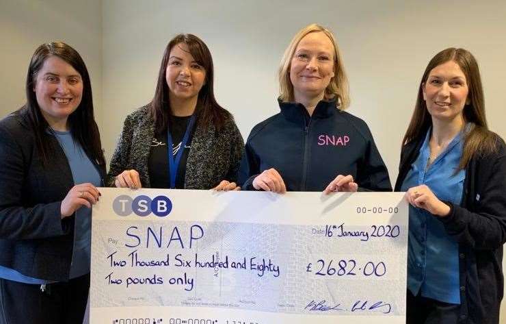 Caroline Cumming and Kirsten Beaton (left and right), from TSB, with Jenni Campbell and Dawn Walker, from SNAP.