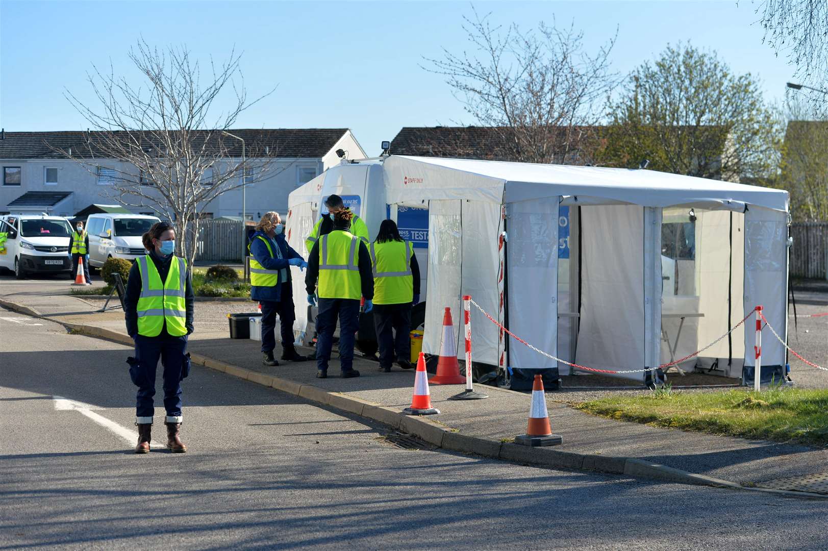 Staff at the mobile testing unit in the car park of Merkinch Community Centre.