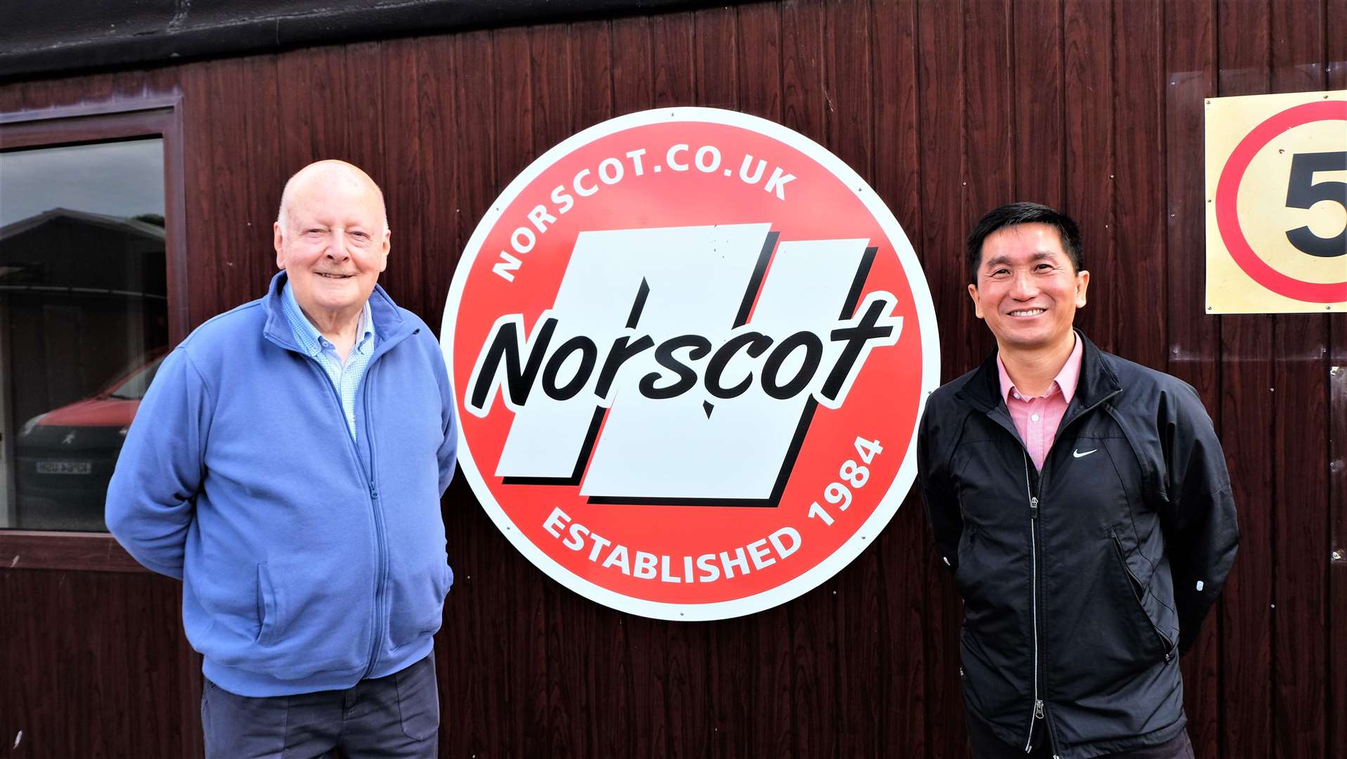 Former chairman and co-founder of Norscot Peter Body, at left, with 1st FSD Group CEO Tom Wang.